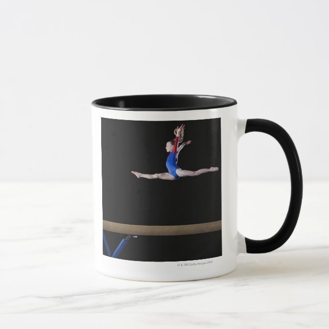 Gymnast (9-10) leaping on balance beam 2 mug (Right)
