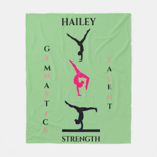 Gymnastics fleece blanket with personalized name.