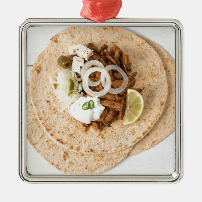 Gyros pita with tzatziki coleslaw olives and feta metal ornament (Front)