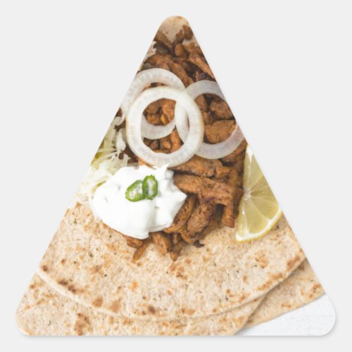 Gyros pita with tzatziki coleslaw olives and feta triangle sticker