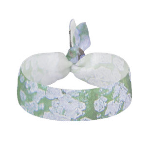 Hair tie ice cubes and green background