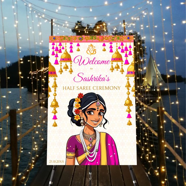 Half Saree ceremony cute Indian girl welcome sign (Saree ceremony welcome sign board cute Indian girl in sari pink and gold bells garland welcome board)