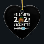 Halloween 2021 Vaccinated Funny Costume Ceramic Ornament<br><div class="desc">Halloween 2021 Vaccinated Funny Costume
vaccinated, vaccine, halloween, 2021, gift, ideas, scary, pumpkin, birthday, halloween trick or treat, spooky, horror, zombie, black, ghost, trick or treat, witch, skull, humor, vintage, retro, gifts</div>