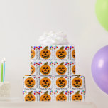 Halloween Birthday Orange Pumpkin Wrapping Paper<br><div class="desc">Fun Halloween Birthday. Smiling orange jack-o-lantern pumpkin with red eyes and big brown stalk and yellow smile. Colorful flying balloons adorn wrapping paper in red, blue, orange, green, yellow. Happy Birthday is written in black text bottom of pumpkin, and Happy Halloween Birthday written in a fun font on sides of...</div>