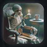 Halloween Birthday Skeleton  Paper Plates<br><div class="desc">A skeleton sits in a worn armchair holding a cupcake with a lit birthday candle for a Halloween birthday Party.
Text can be changed or deleted</div>