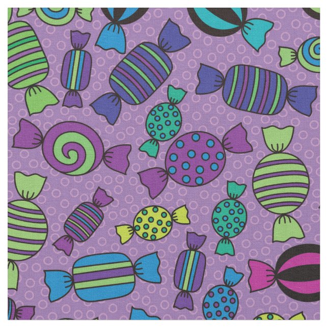 Halloween Candy Treats on Purple Pattern Fabric (Close Up)