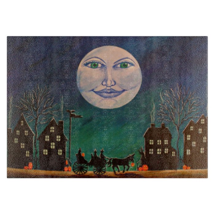 Halloween cutting board with witches, village