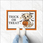 Halloween Dalmatian Dog Trick or Treat Doormat<br><div class="desc">This cute Halloween personalized doormat features an adorable dalmatian puppy with bats and a jack o lantern pumpkin with a matching border of black and orange.  Personalize with your choice of holiday message.  Fun for your holiday party decor.</div>