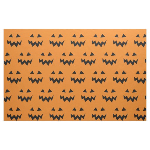Halloween fabric with carved pumpkin face pattern