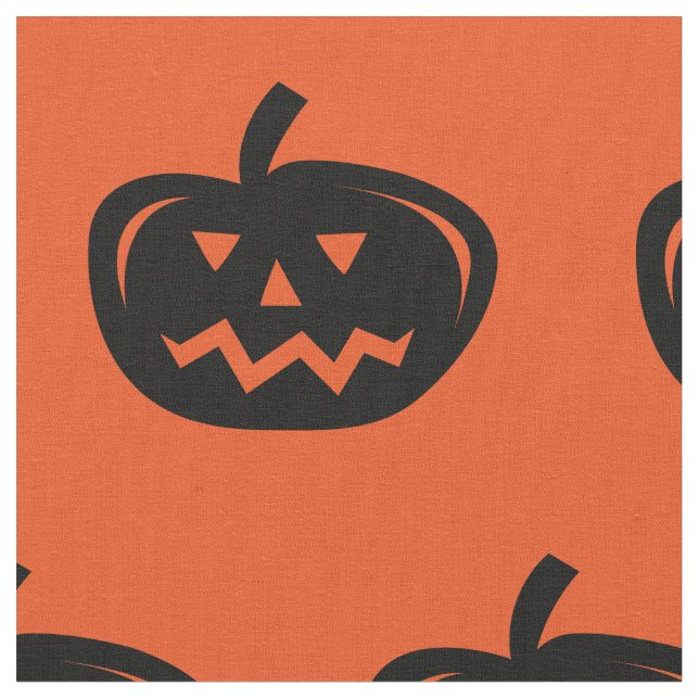 Halloween fabric with pumpkin head carving print (Close Up)