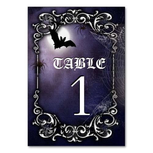 Halloween gothic theme with bats and a full moon table number