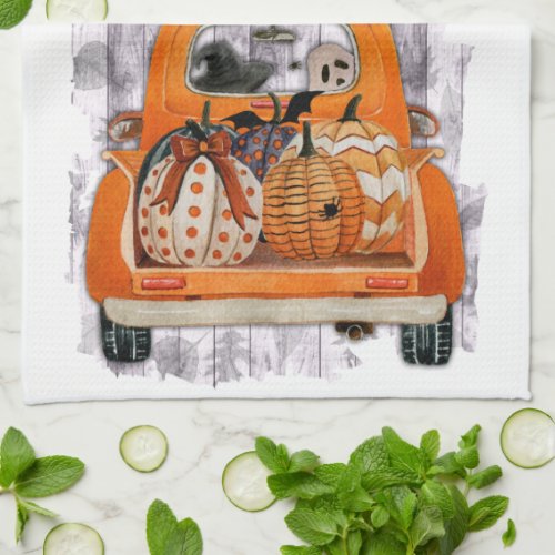 Halloween harvest orange pickup truck with pumpkin kitchen towel