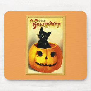Halloween Kitty Sitting in Jack O Lantern Mouse Pad