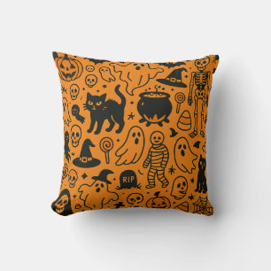 Halloween pumpkin, skull, and ghost pattern pillow
