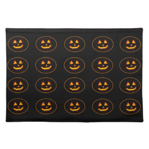 Halloween pumpkins on black cloth placemat