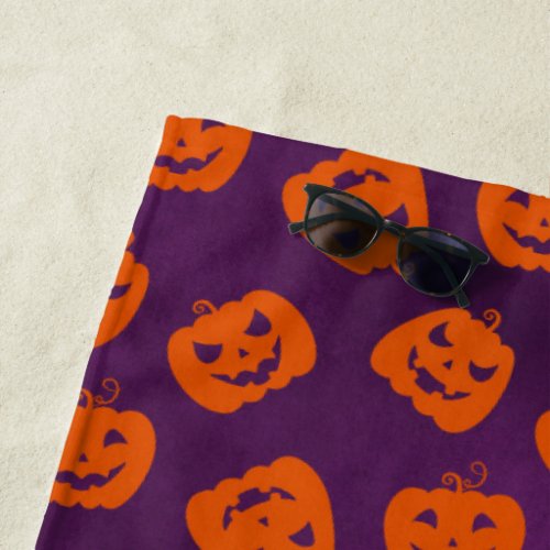 Halloween Pumpkins on Purple Background Pattern Beach Towel