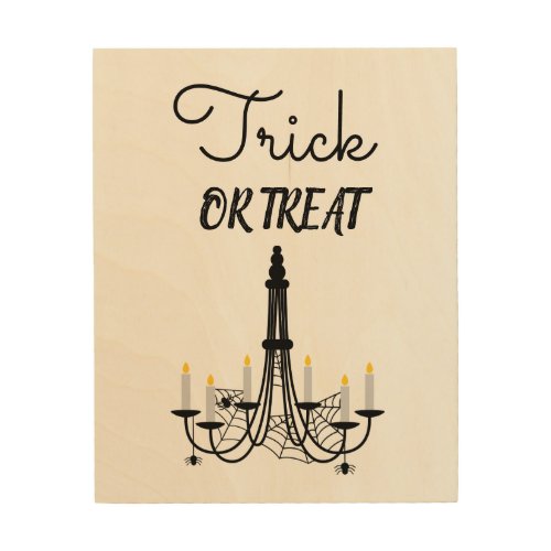 Halloween sign chandelier trick or treat slogan