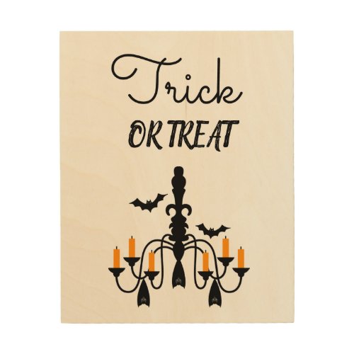 Halloween sign chandelier trick or treat slogan