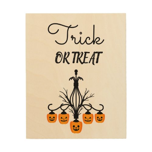 Halloween sign chandelier trick or treat slogan