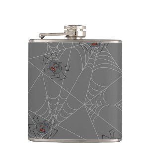 Halloween spiders web and pumpkins flask