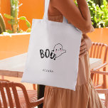 Halloween Trick or Treat Whimsical Cute Ghost Boo Tote Bag<br><div class="desc">Make trick-or-treating extra adorable with this whimsical cute ghost Halloween tote bag! Featuring a sweet, smiling ghost and playful “Boo!” typography, this tote is perfect for carrying candy on Halloween night. Ideal for kids, toddlers, and even teens who love a spooky-cute vibe. Great for school Halloween parties, costume events, or...</div>