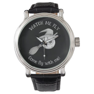 Halloween witch broom and scary eyeball watch