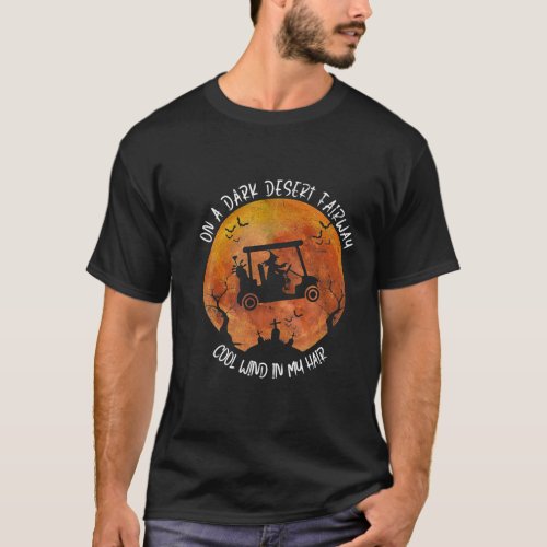 Halloween Witch Riding Golf Cart On A Dark Desert T_Shirt