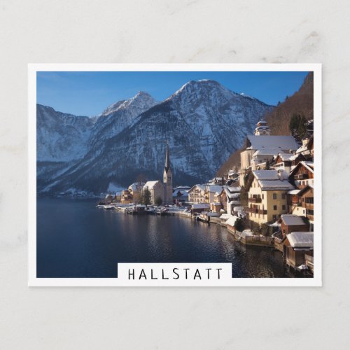 Hallstatt town in the snow in winter postcard