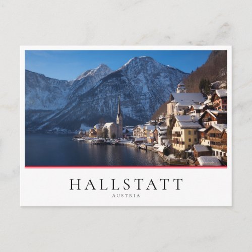 Hallstatt town in the snow in winter postcard