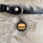 Hamburger Fast Food Cartoon Illustration Pet ID Tag<br><div class="desc">Destei's illustration of a hamburger snack that has a sesame seed bun that is filled with cheese, lettuce, beef, tomato, ketchup and pickles. The background color is dark gray, nearly black. On the other side there are two personalizable text areas where one is ideal for the name of the pet...</div>