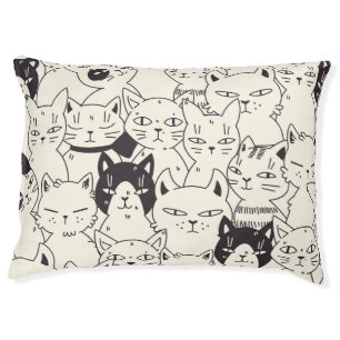 Hand-drawn cats doodle seamless pattern. pet bed