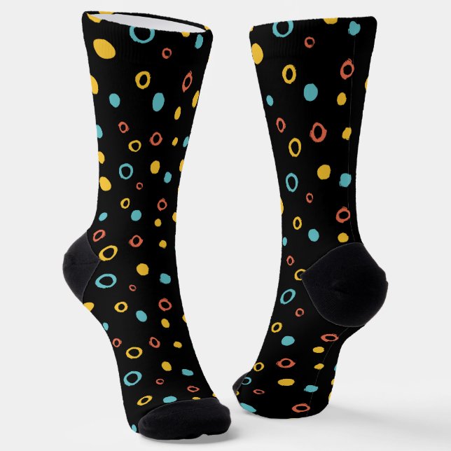 Hand drawn colorful circle pattern on a black  socks (Angled)