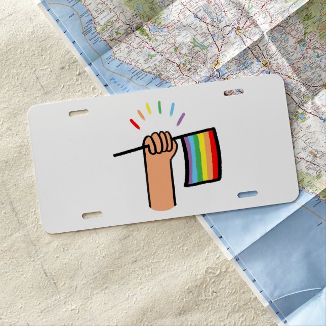 Hand Drawn Hand Waving a Rainbow Flag License Plate (In Situ)