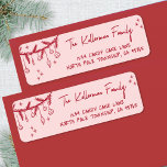 Hand Drawn Red Christmas Return Address Label<br><div class="desc">Festive Holiday Return Address Label. This cheerful design features a doodle swag of red greenery and hanging ornaments in the top left corner, with scattered red star doodles across a blush pink background for a festive touch. Your name and address appear on the right in red fonts using a mix...</div>