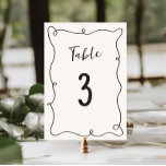Hand Drawn Squiggle Frame Wedding Table Number<br><div class="desc">Celebrate in style with our quirky and fun wedding table number featuring a hand drawn squiggle frame and casual handwritten script in a neutral color scheme of dark gray on ecru.</div>