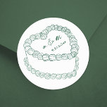Hand Drawn Vintage Cake Green Whimsical Wedding Classic Round Sticker<br><div class="desc">Personalized Vintage Cake Wedding Monogram Stickers. These custom round wedding stickers feature a simple vintage-style cake illustration at the center, topped with the couple’s monogram initials and wedding date for a timeless and elegant touch. The minimalist design uses a mix of handwritten and script fonts in emerald green, keeping the...</div>