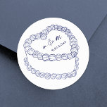 Hand Drawn Vintage Cake Navy Blue Wedding Classic Round Sticker<br><div class="desc">Personalized Vintage Cake Wedding Monogram Stickers. These custom round wedding stickers feature a simple vintage-style cake illustration at the center, topped with the couple’s monogram initials and wedding date for a timeless and elegant touch. The minimalist design uses a mix of handwritten and script fonts in classic navy blue, keeping...</div>