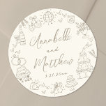Hand Drawn Whimsical Wedding Classic Round Sticker<br><div class="desc">Personalized Hand-Drawn Quirky Wedding Stickers. These fun and playful round wedding stickers feature quirky doodle illustrations surrounding the edges in soft tan against a crisp ivory background, creating an elegant, muted look. Elements like a champagne tower, wedding cake, disco ball, hearts, wedding bells, rings, cameras, and more are rendered in...</div>
