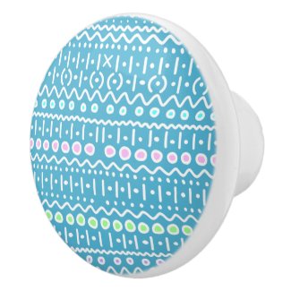 Hand drawn white and blue pattern button