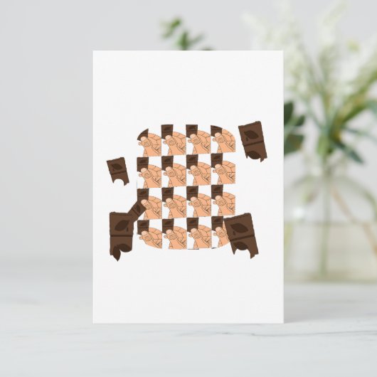 Hand holding a piece of Valentine's chocolate (Standing Front)