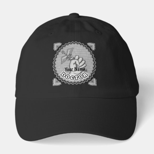 Hand holding caduceus doctor  hat (Front)