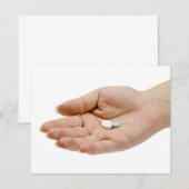 Hand holding pills (Front/Back)