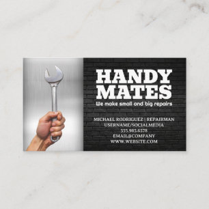 Hand Holding Wrench Metal and Brick Business Card