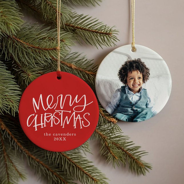 Hand Lettered Merry Christmas Custom Photo Ceramic Ornament (Festive red hand-lettered Merry Christmas family name, year, and photo ornament.)