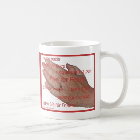 Hand, pray for peace coffee mug