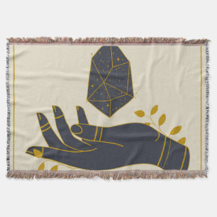 Hand with healing crystal throw blanket