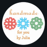"Handmade" holiday gift label<br><div class="desc">Cute,  classy gift label for the holidays,  featuring kids' snowflake cutouts.  Perfect for any homemade gift,  from a tin of cookies to a hand-knit scarf.  Personalize in a flash by replacing our sample name with yours.  Creators give half their proceeds to children's charities.</div>