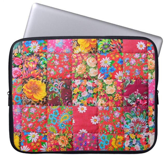 Handmade patchwork quilt with floral pattern as ba laptop sleeve (Front)