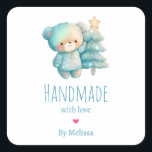 Handmade with Love Cute Bear and Christmas Tree Square Sticker<br><div class="desc">Handmade with Love product stickers with an adorable illustration. A cozy bear with stars and sparkles in its fur. Standing beside a Christmas tree. Pastel blue-green color. Whimsical and cute.</div>