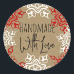 Handmade with Love Snowflake Christmas Craft Classic Round Sticker<br><div class="desc">Brown craft paper background print pattern with red and white snowflake shapes around the border of this fun crafty card. Modern and unique Personalized gift tag label sticker. Add your custom text. The look of brown paper bag sack type recycled-looking textured print is modern and fun!</div>